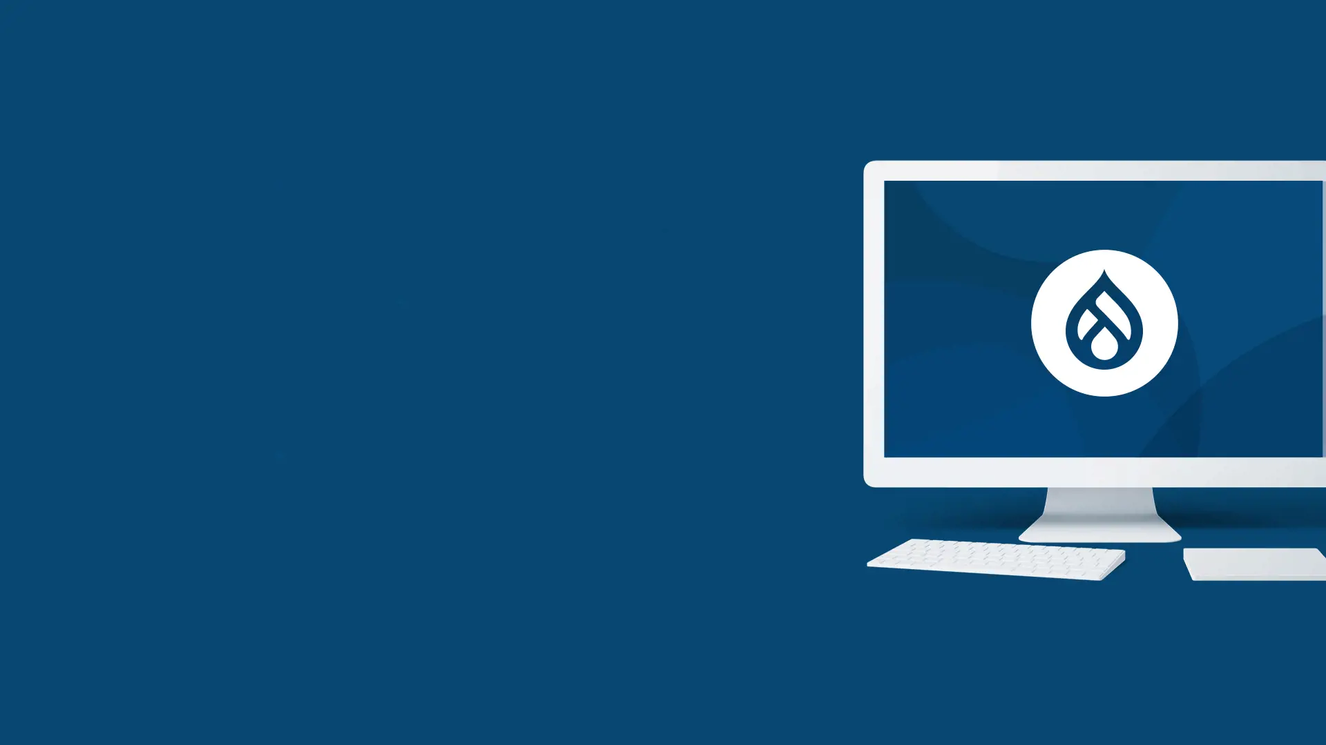 Desktop computer displaying Drupal logo on deep blue background