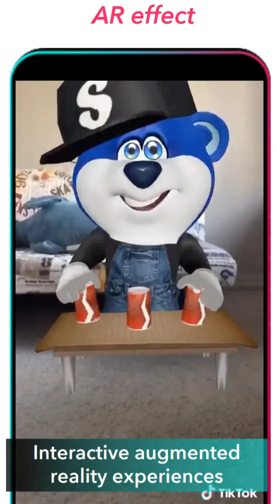 Screenshot of a TikTok video demonstrating an augmented reality effect featuring a cartoon bear character.